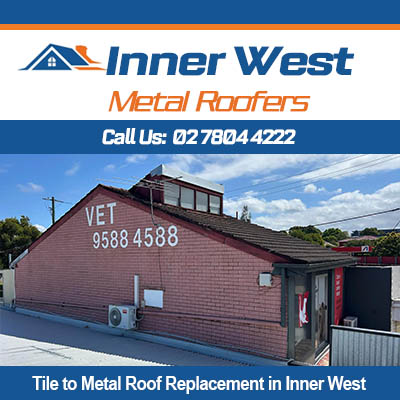 Metal roof replacing tiles on brick commercial building, Inner West Sydney